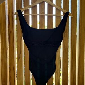 Excellent condition ( never worn) high quality black baining suit - size 38